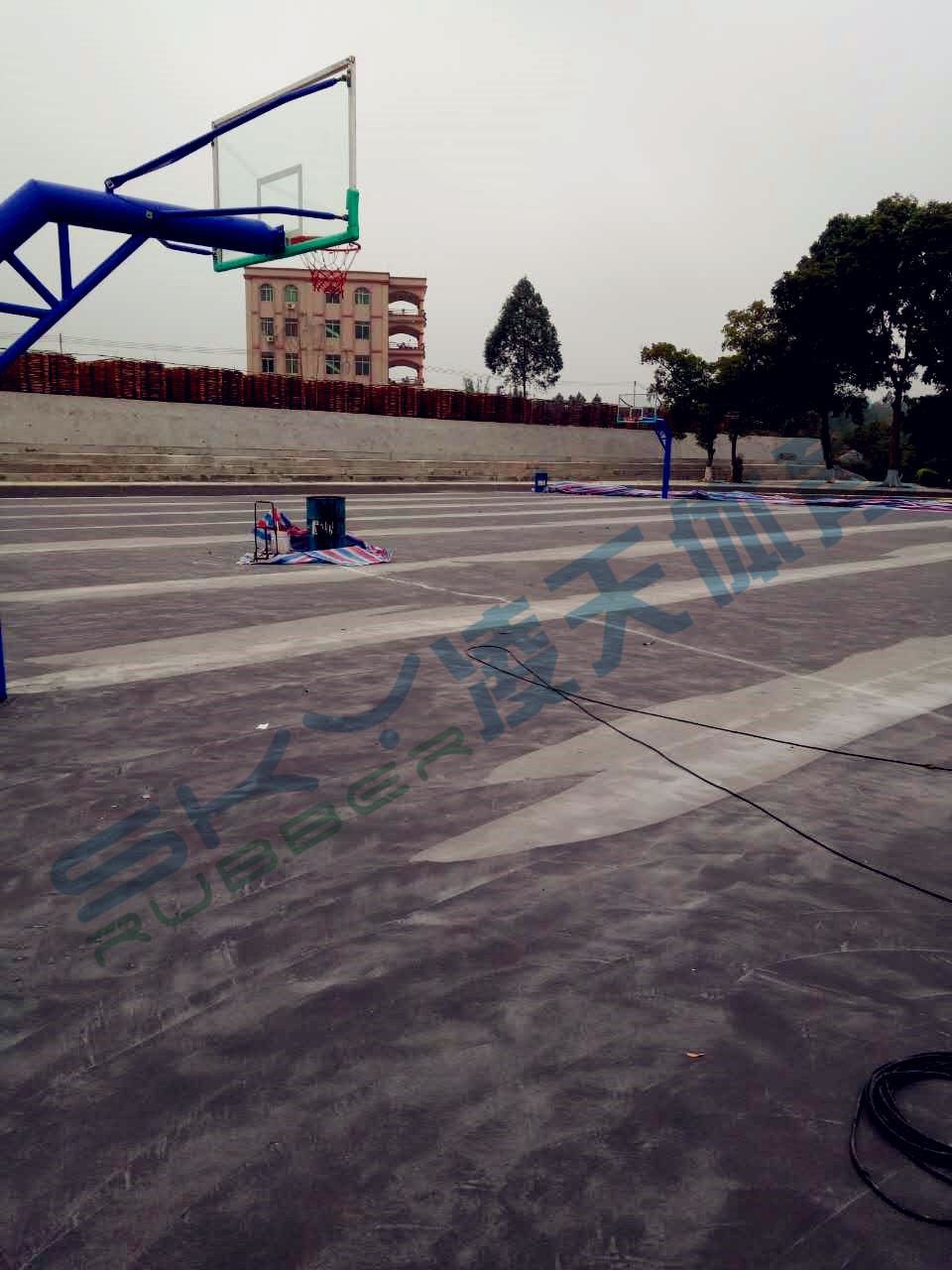 丙烯酸蓝球场案例：江门市鹤山宅梧小学弹性丙